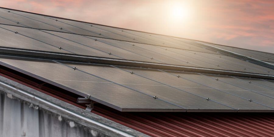 Blog_Solar Panels on Metal Roof_900x450
