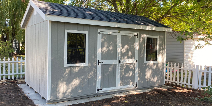 Shed in backyard with double doors