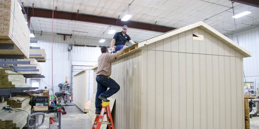 workers building a shed