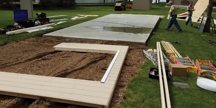 Phase 1 of on-site construction—cement foundation for on-site construction of a garage