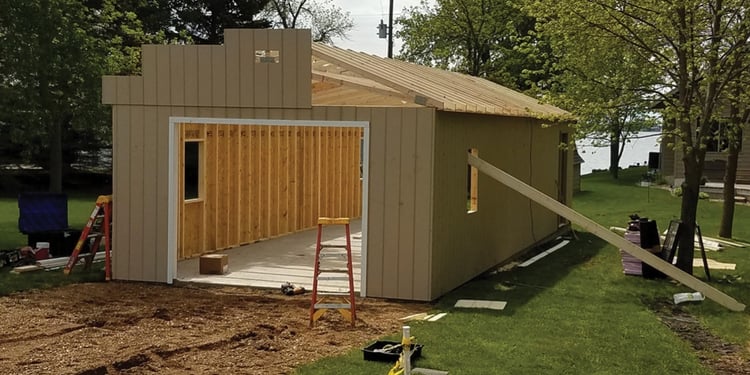  Phase 2 of on-site construction—walls finished with 6” on center and roof trusses up