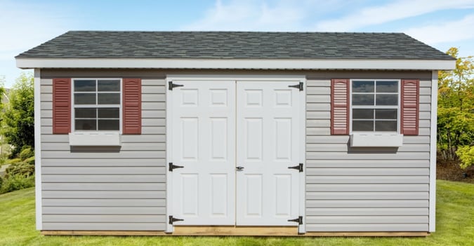Ranch style shed with vinyl lap siding