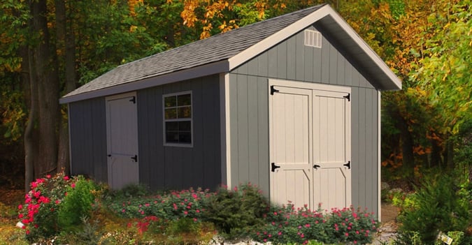 Ranch style shed with painted wood panel siding