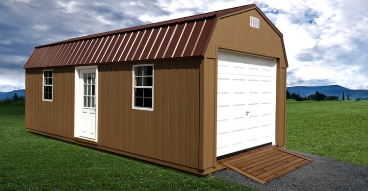 Dakota Storage Prebuilt Garage Package - Ranch style with metal roof, wood panel siding, overhead garage door, and ramp