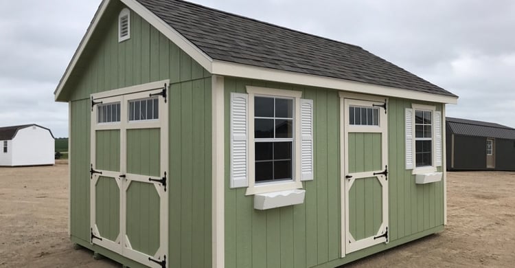 Window shutters and flower boxes make any shed look great