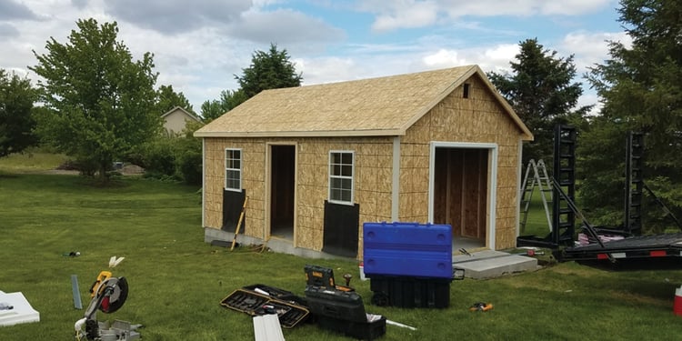 Phase 2—walls up, roof in place, windows installed