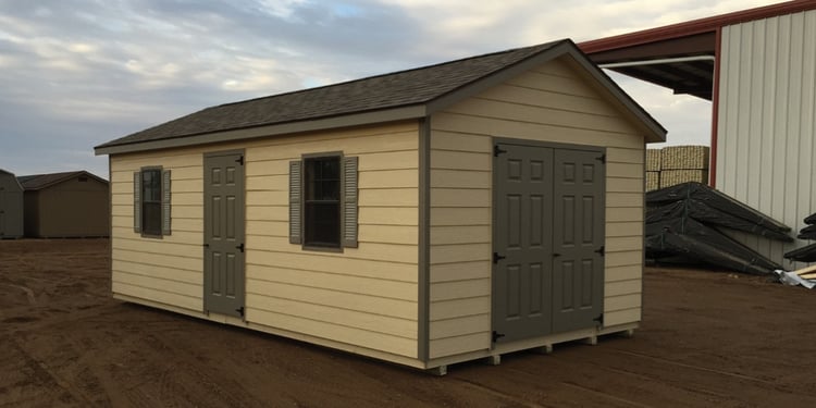 Ranch style shed with a double fiberglass door and Lap siding