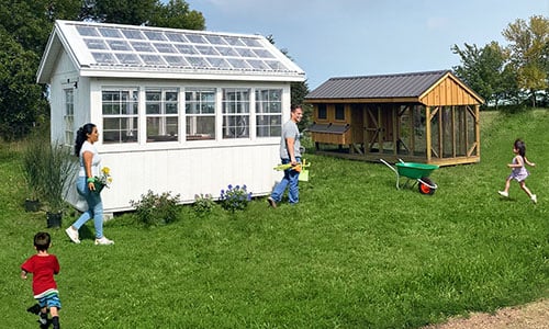 Family enjoying backyard with Dakota Storage greenhouse, chicken coop, and children playing outside