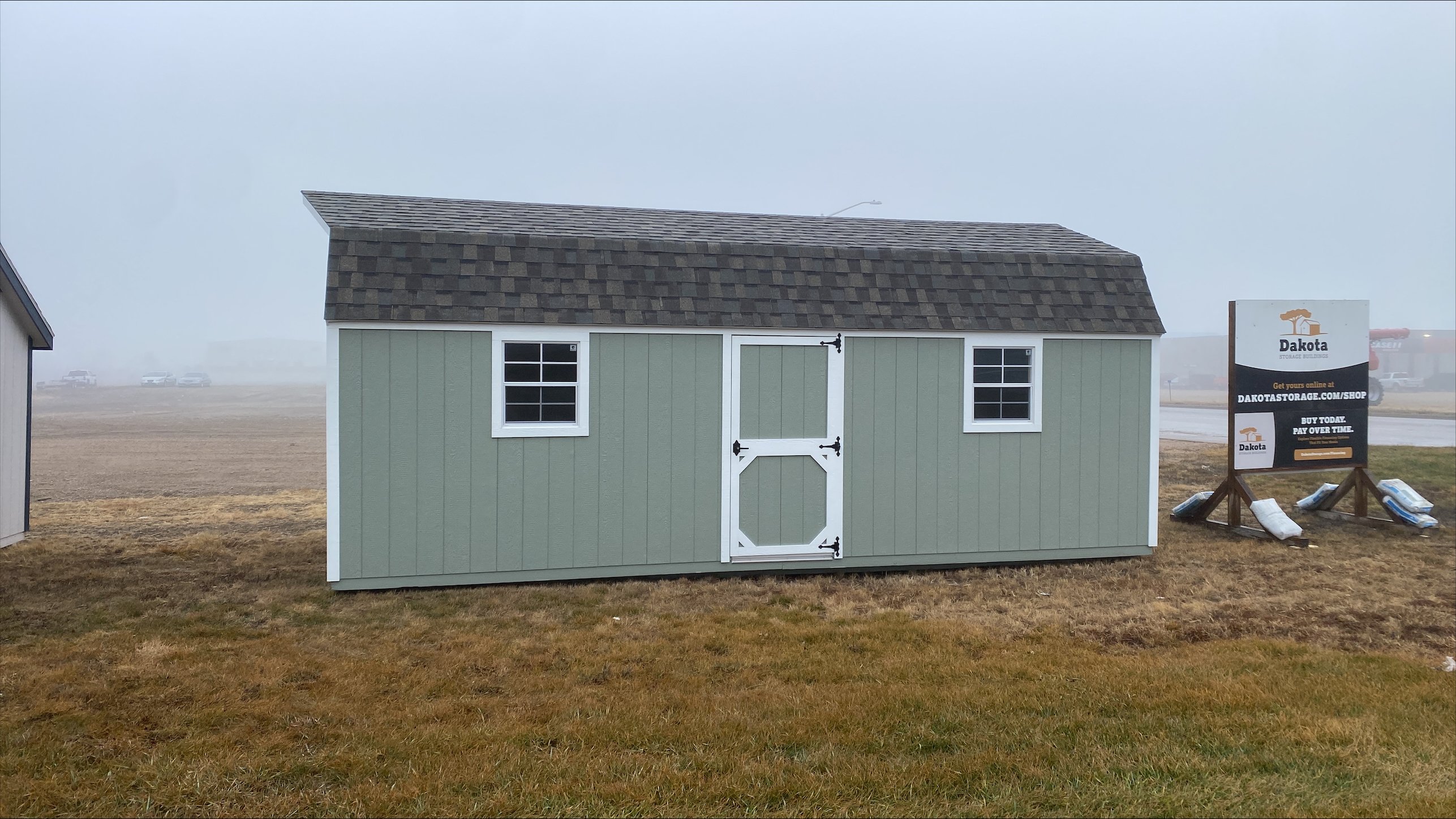 dakota-storage-buildings-brookings-south-dakota-shed-display-lot-exterior-green-shed